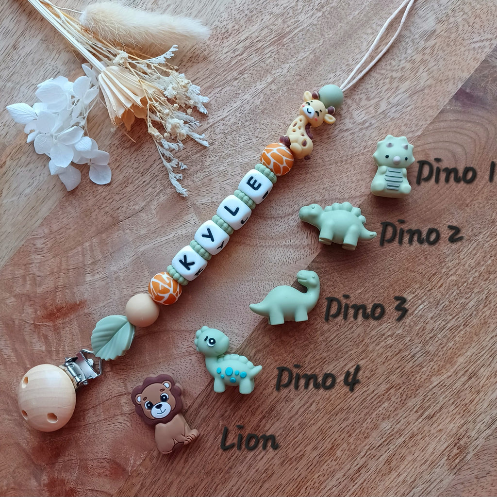 Attache tétine en silicone alimentaire sans BPA, aux normes. Clip en bois et acier inoxydable, perles en silicone, prénom personnalisable, girafe, lion, dinosaure, feuille, safari