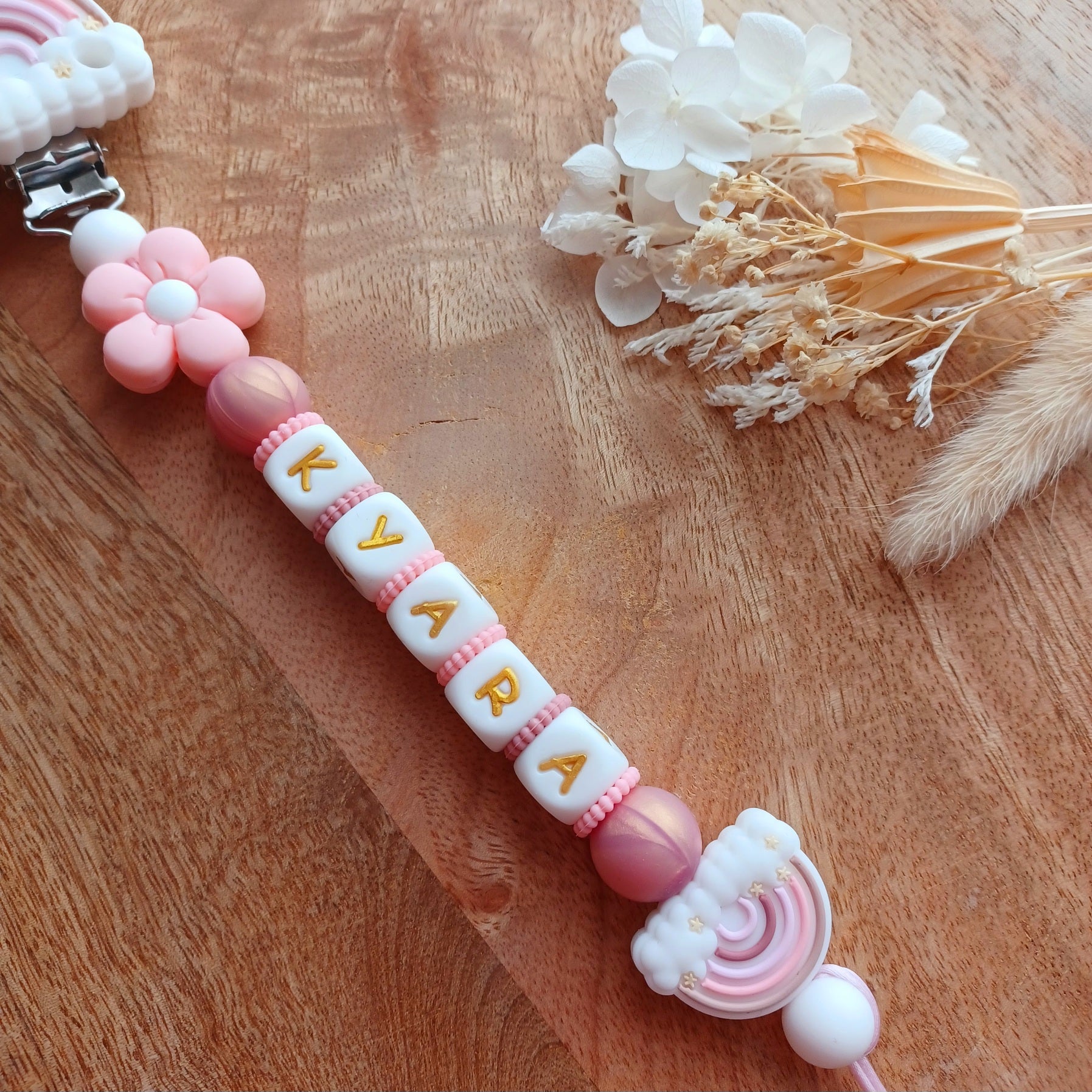 Attache tétine silicone, Arc-en-ciel, fleur rose-blanc.