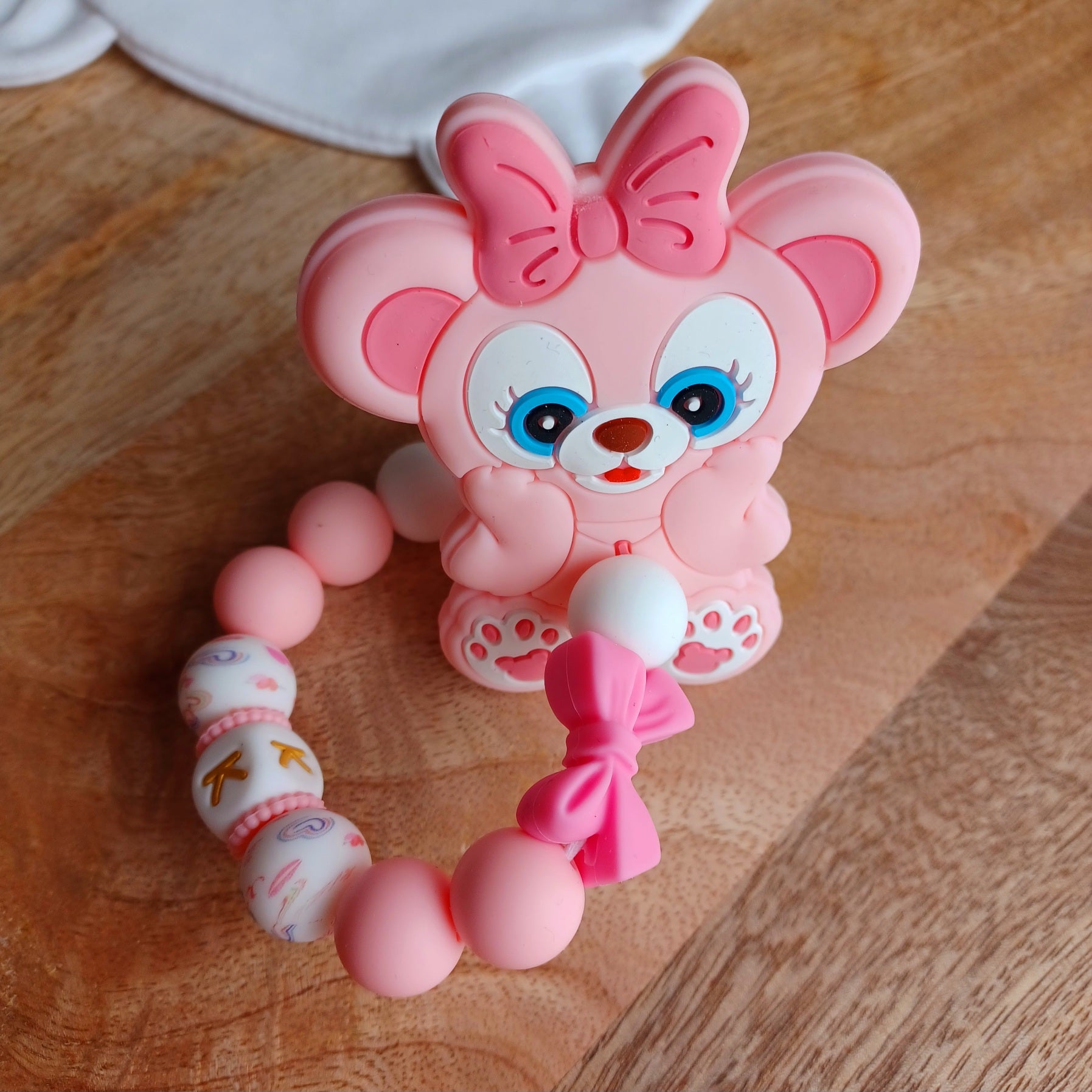 Attache tétine silicone, Oursonne rose blanc.
