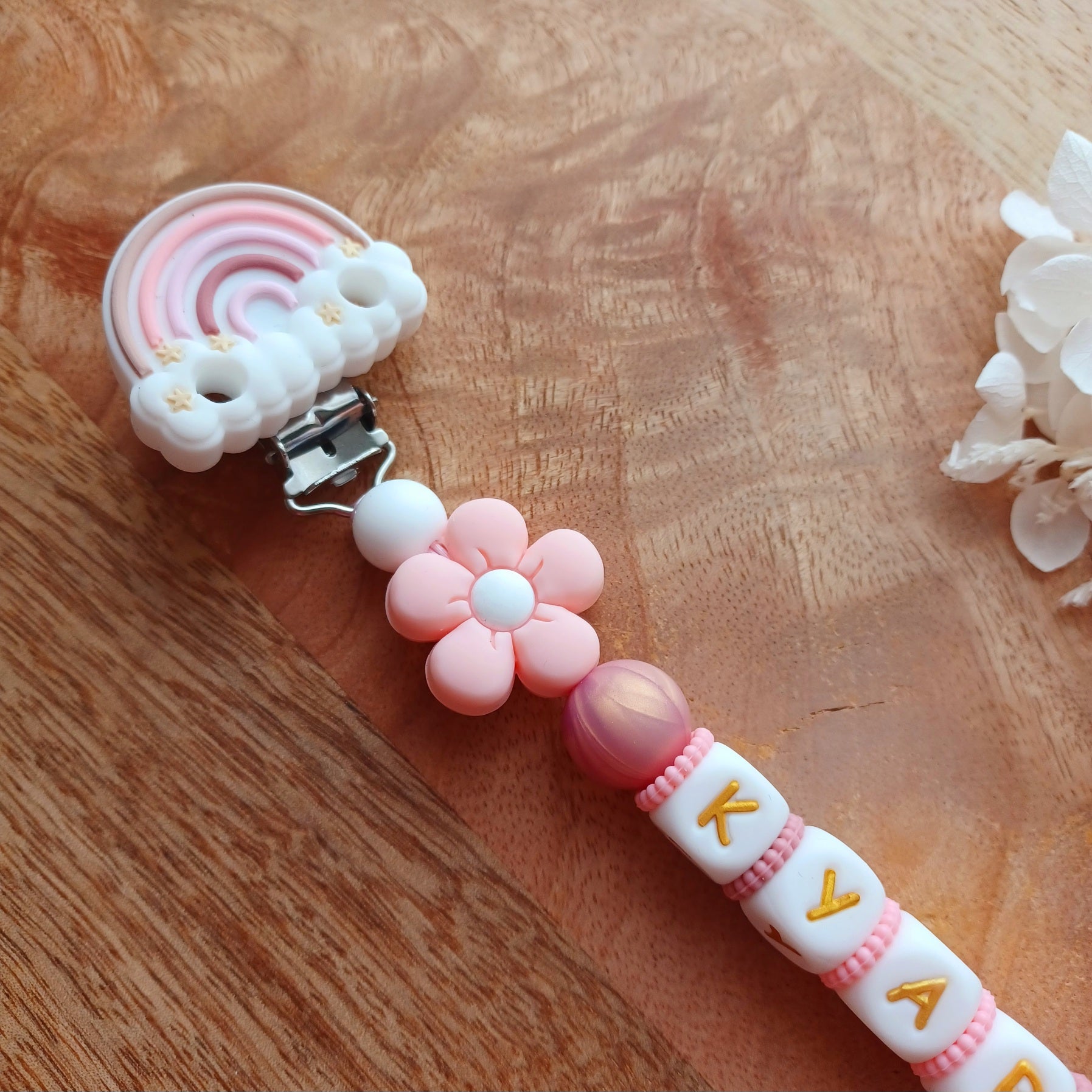 Attache tétine silicone, Arc-en-ciel, fleur rose-blanc.