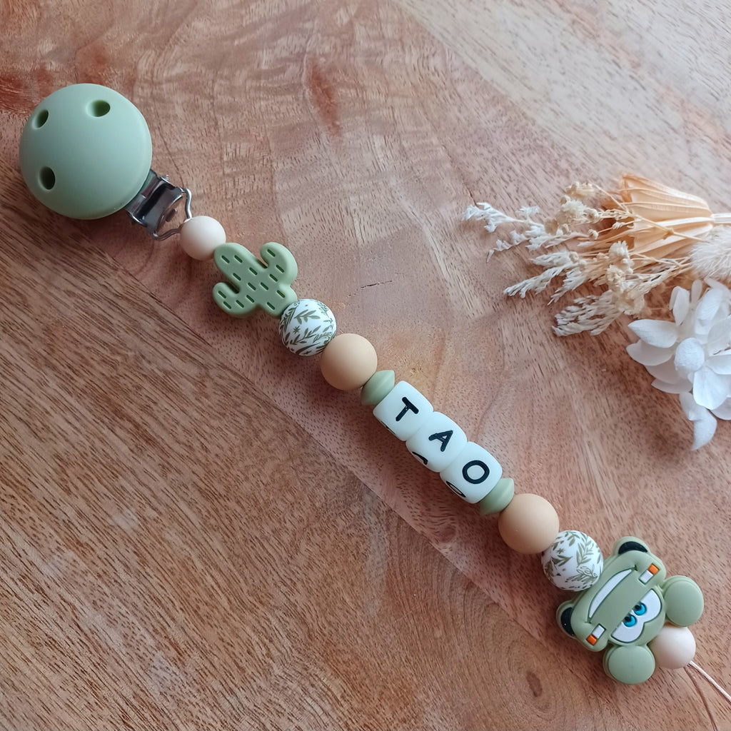 Attache tétine silicone, voiture, blanc, vert. Tao