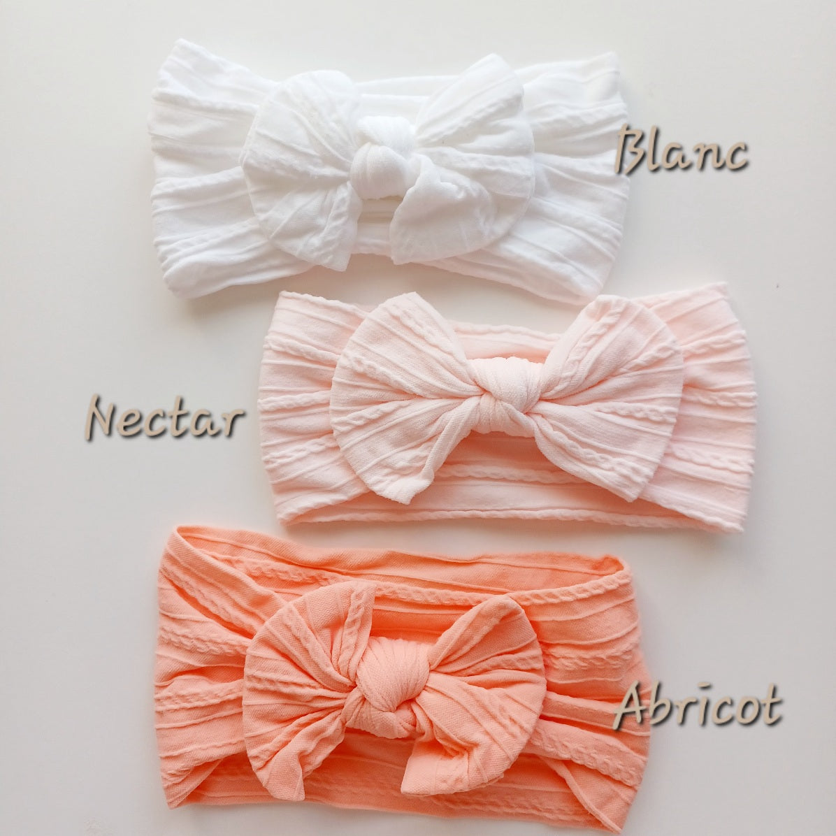 Bandeau bébé élastique avec nœud – Doux, extensible et confortable (Blanc, Nectar, Abricot)