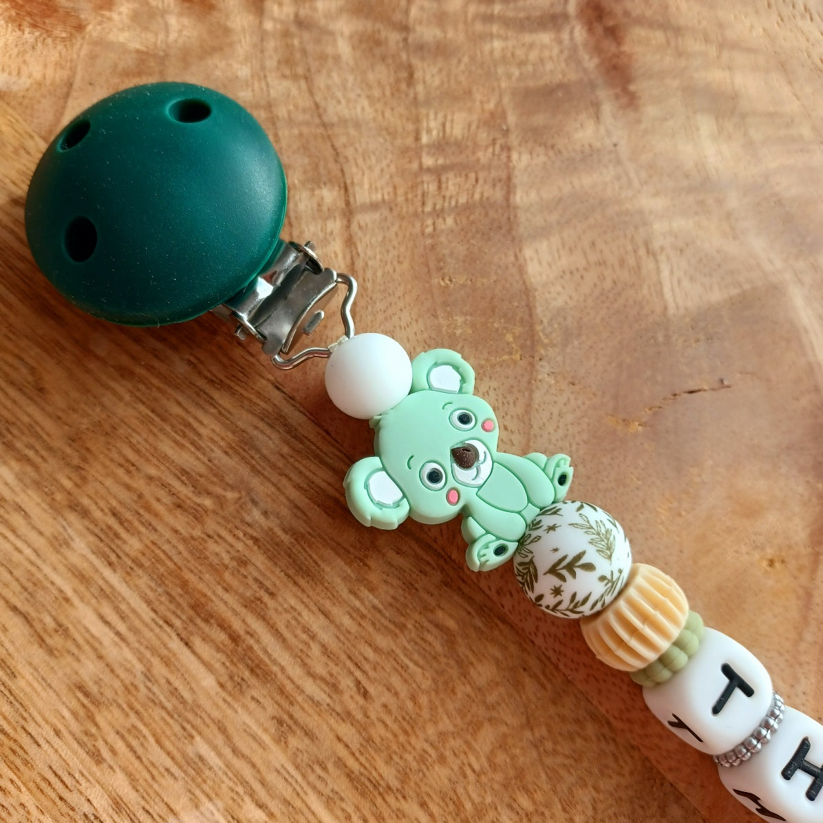 Attache tétine silicone, arc en ciel, Vert. Theo