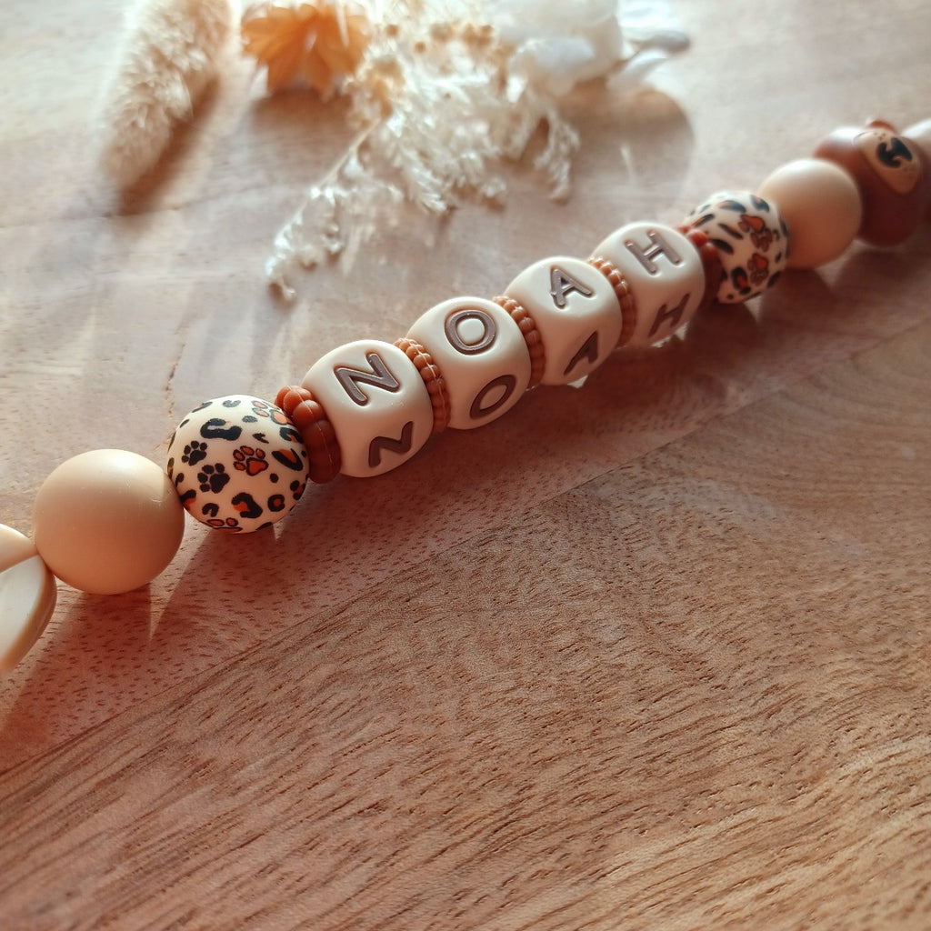 Attache tétine silicone, choco, caramel. Ours