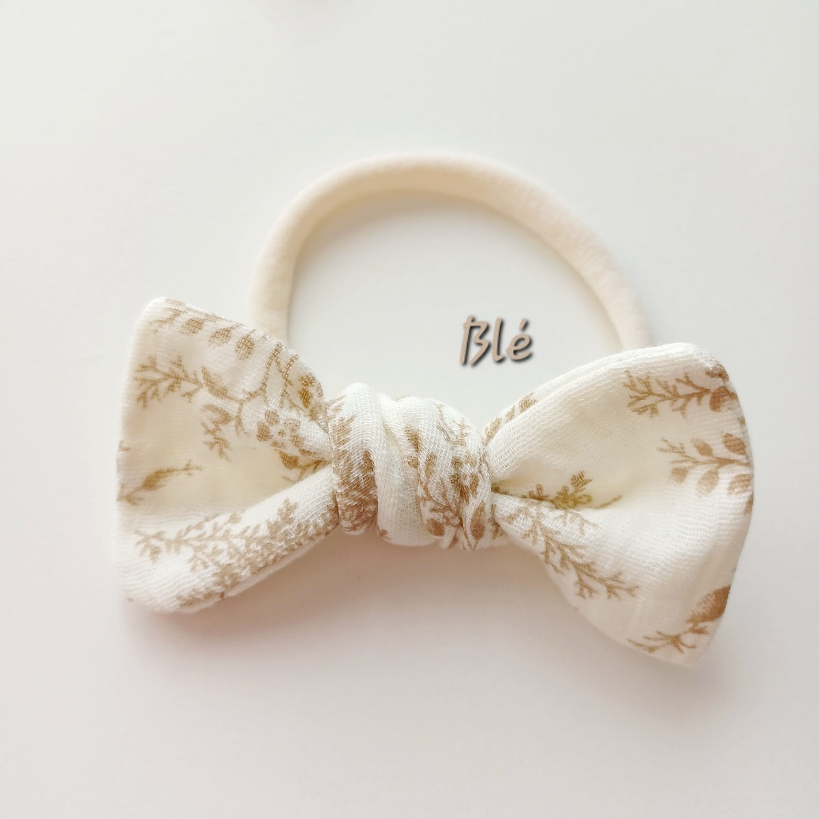 Bandeaux à noeud en gaze de coton pour bébé. Couleurs neutres