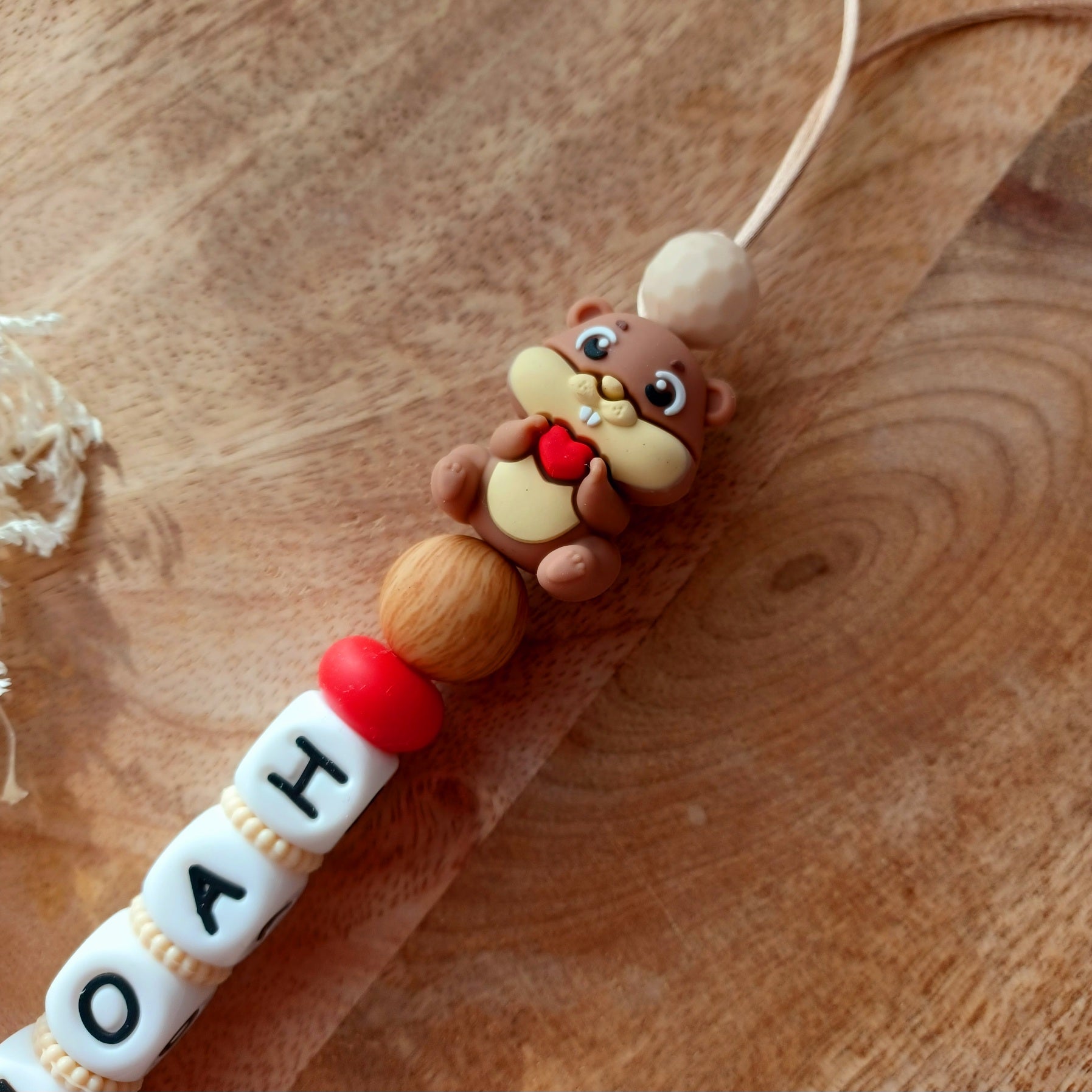 Attache tétine silicone, Castor, crème, choco. Noah