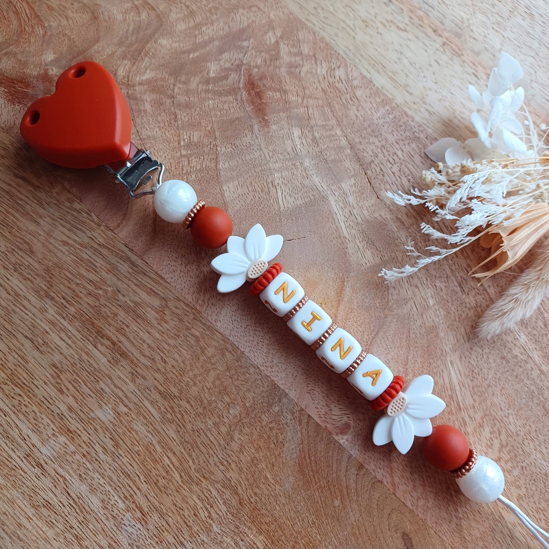 Attache tétine silicone, Fleur de Lotus, coeur terracotta.