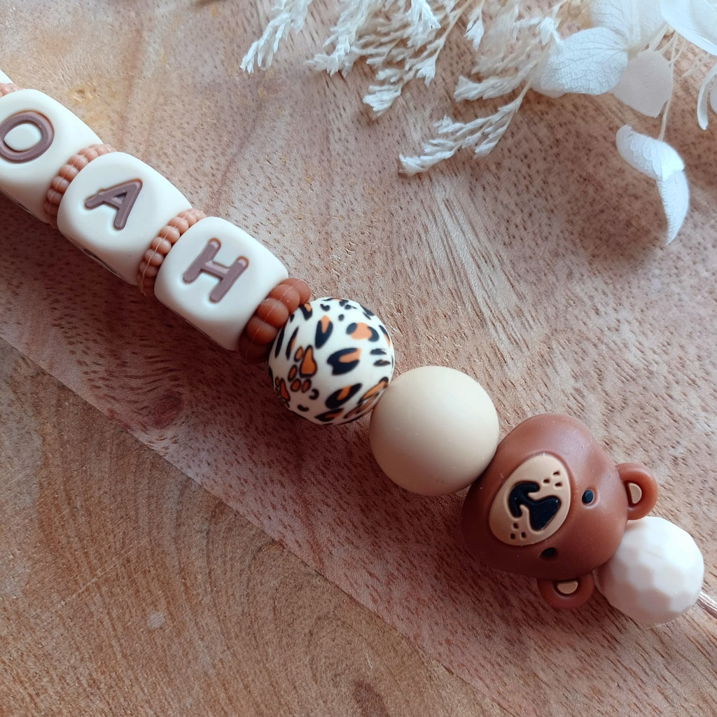 Attache tétine silicone, choco, caramel. Ours