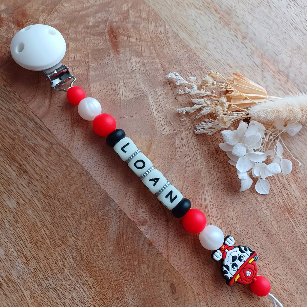 Attache tétine silicone, pompier, chien blanc, rouge, noir. Loan