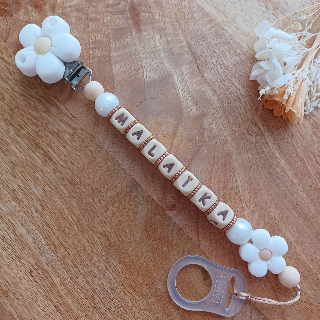 Attache tétine silicone, Fleur blanc, crème. Ayla