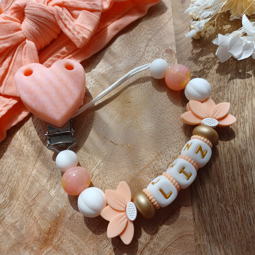 Attache tétine silicone, Fleur de Lotus, coeur abricot