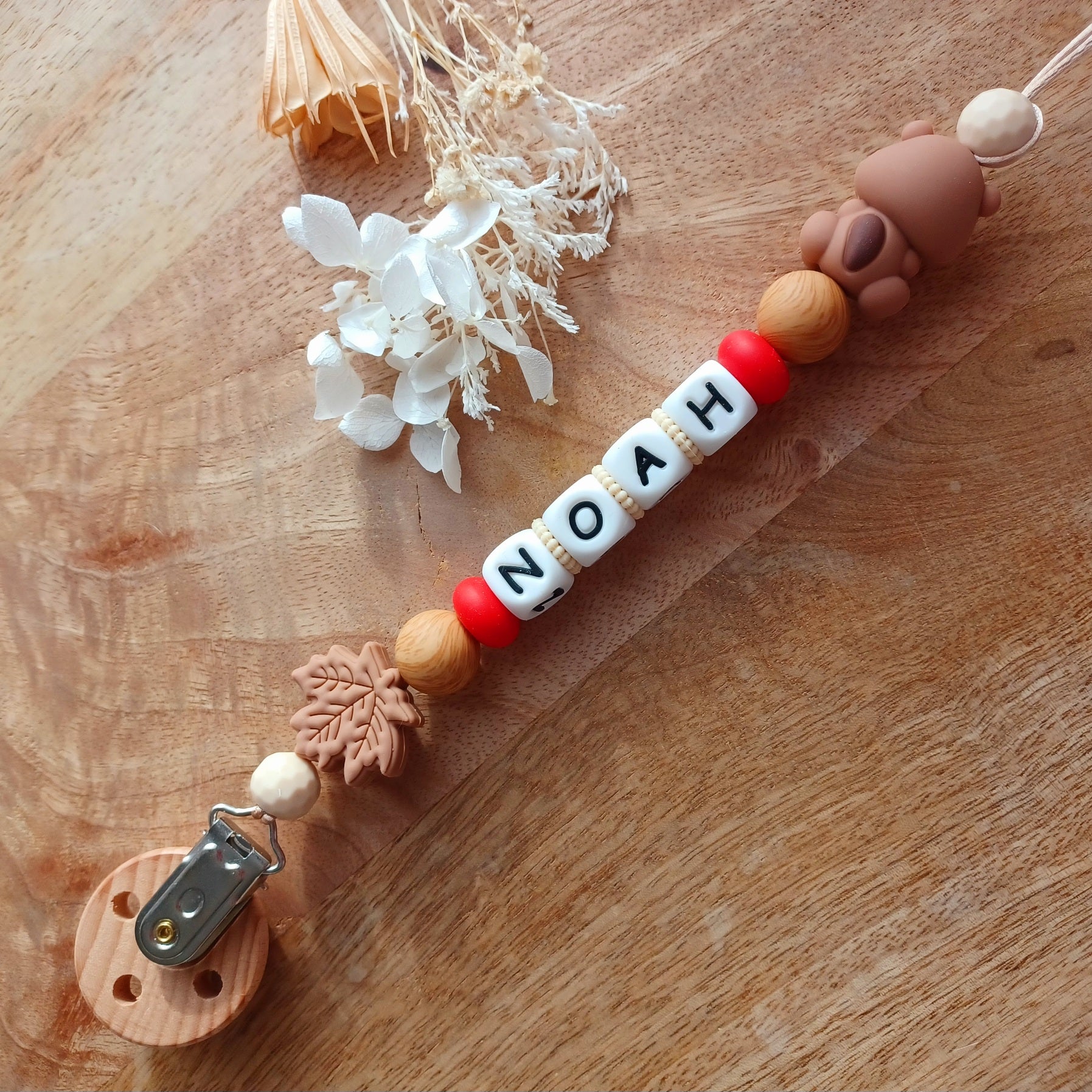 Attache tétine silicone, Castor, crème, choco. Noah