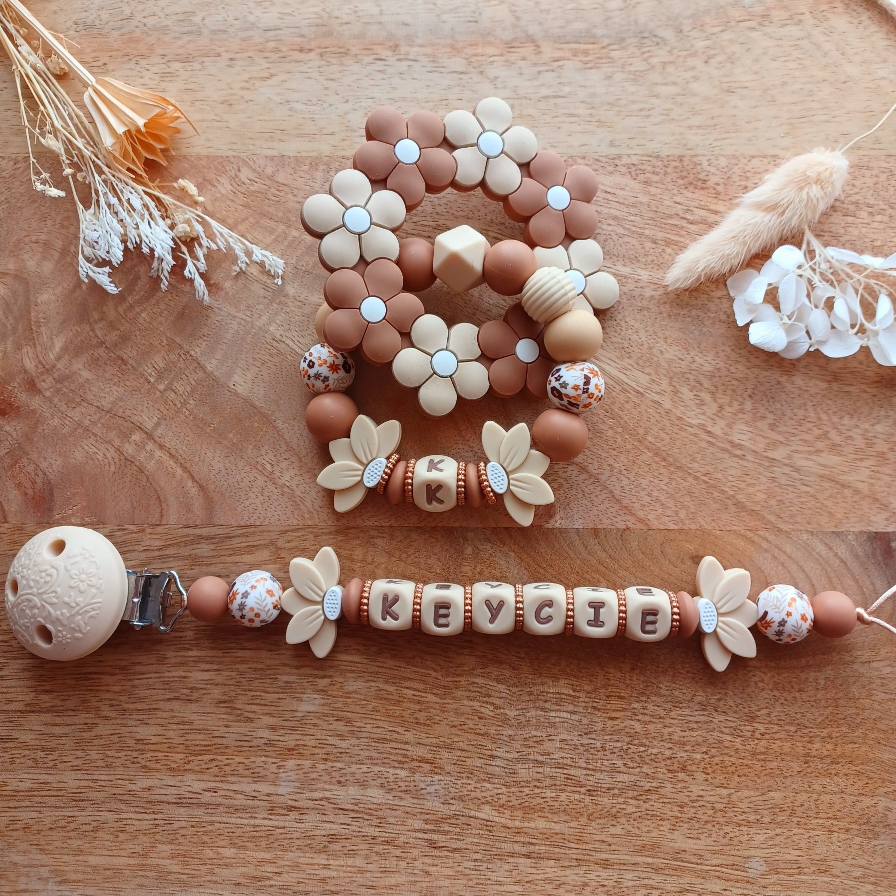 Attache tétine silicone, Choco, fleur de Lotus. Keycie