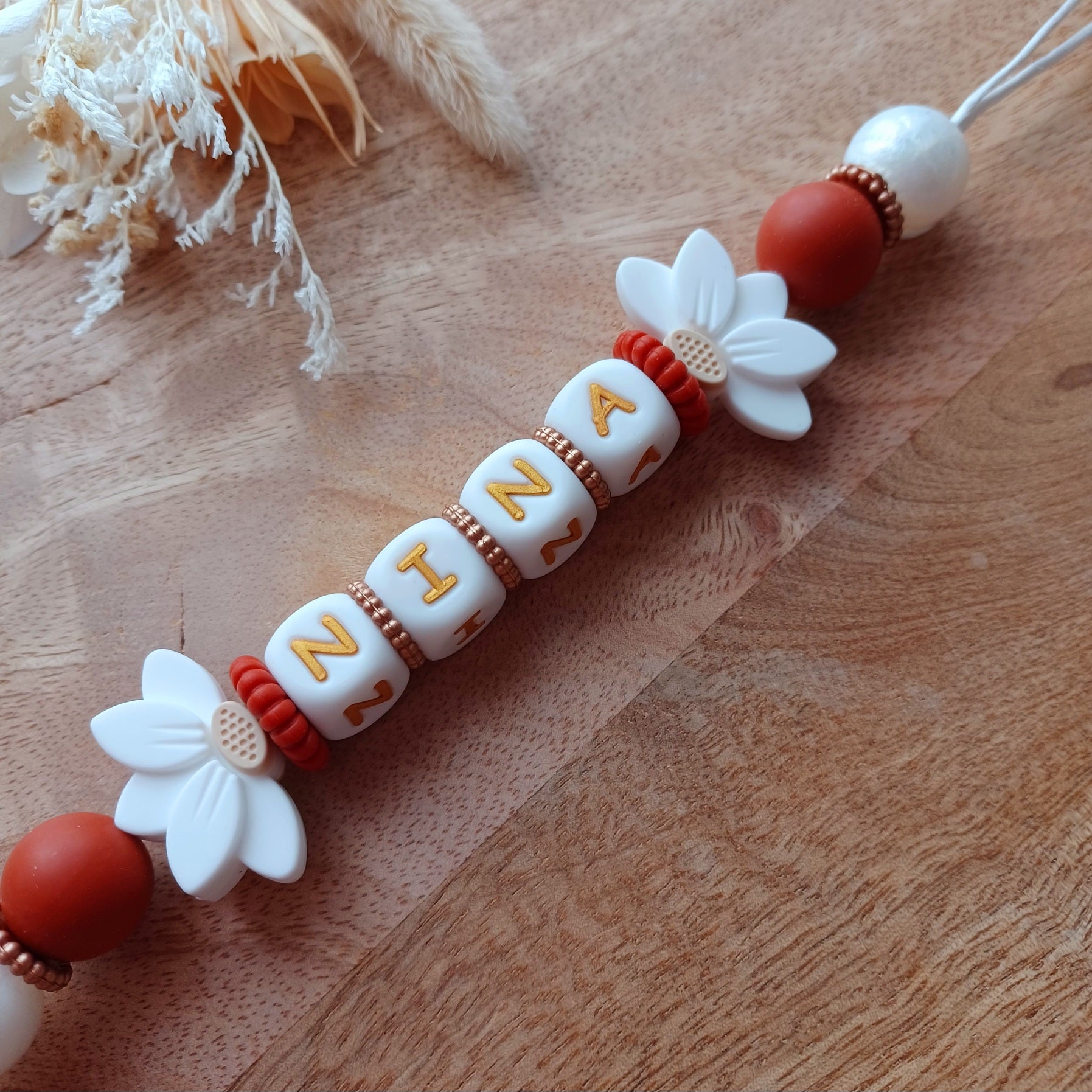 Attache tétine silicone, Fleur de Lotus, coeur terracotta.