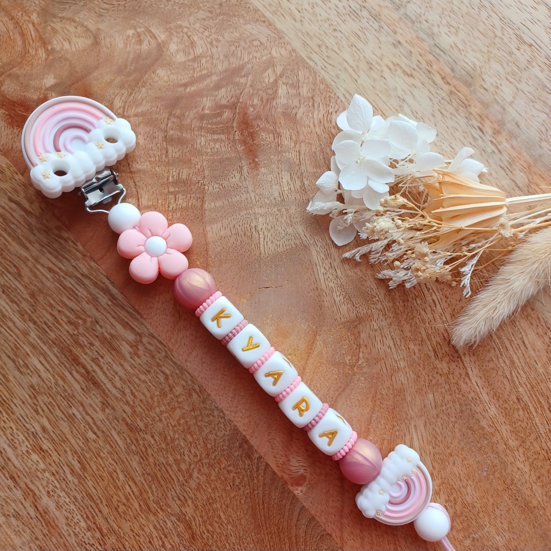 Attache tétine silicone, Arc-en-ciel, fleur rose-blanc.