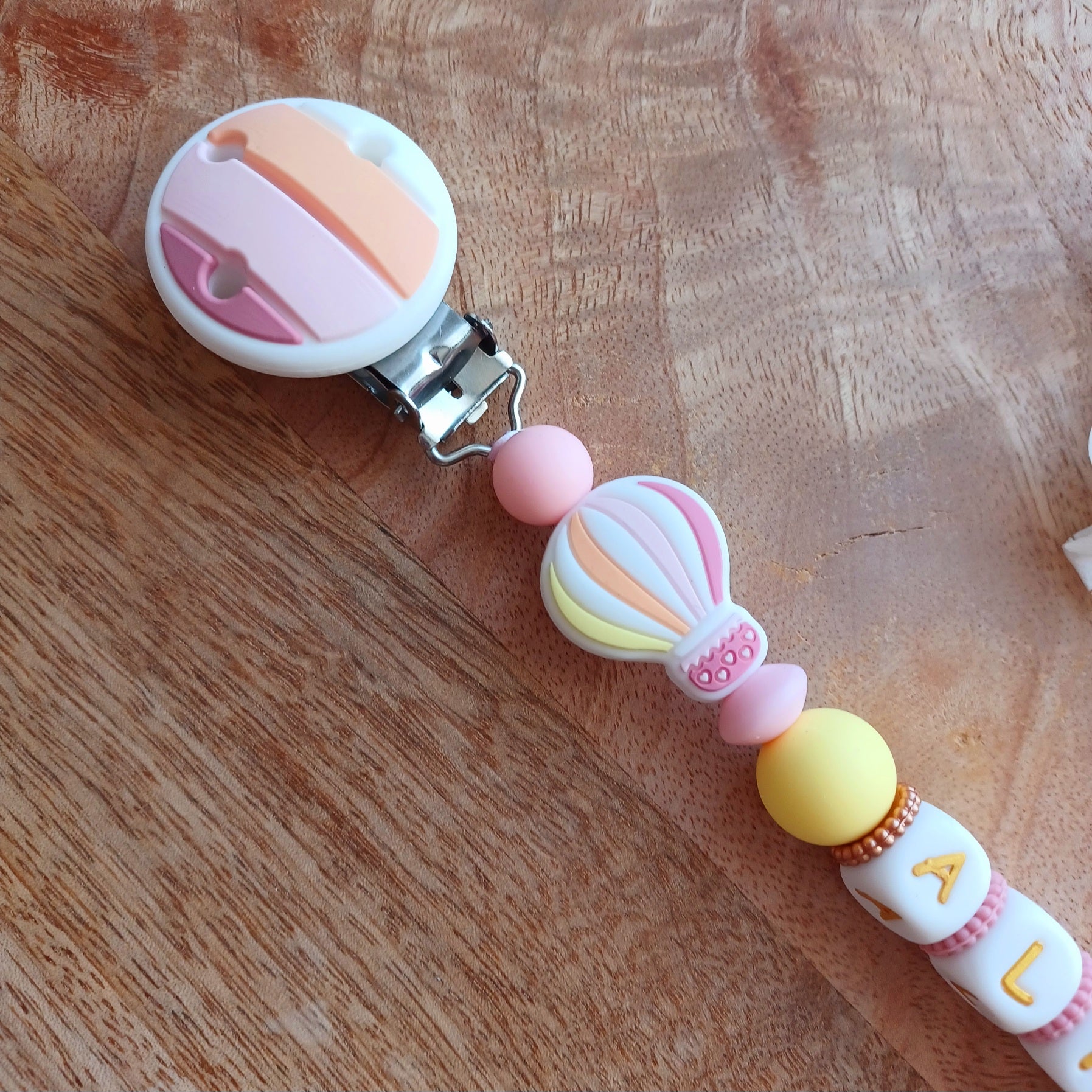 Attache tétine silicone, arc en ciel, rose, pastel. ALMA