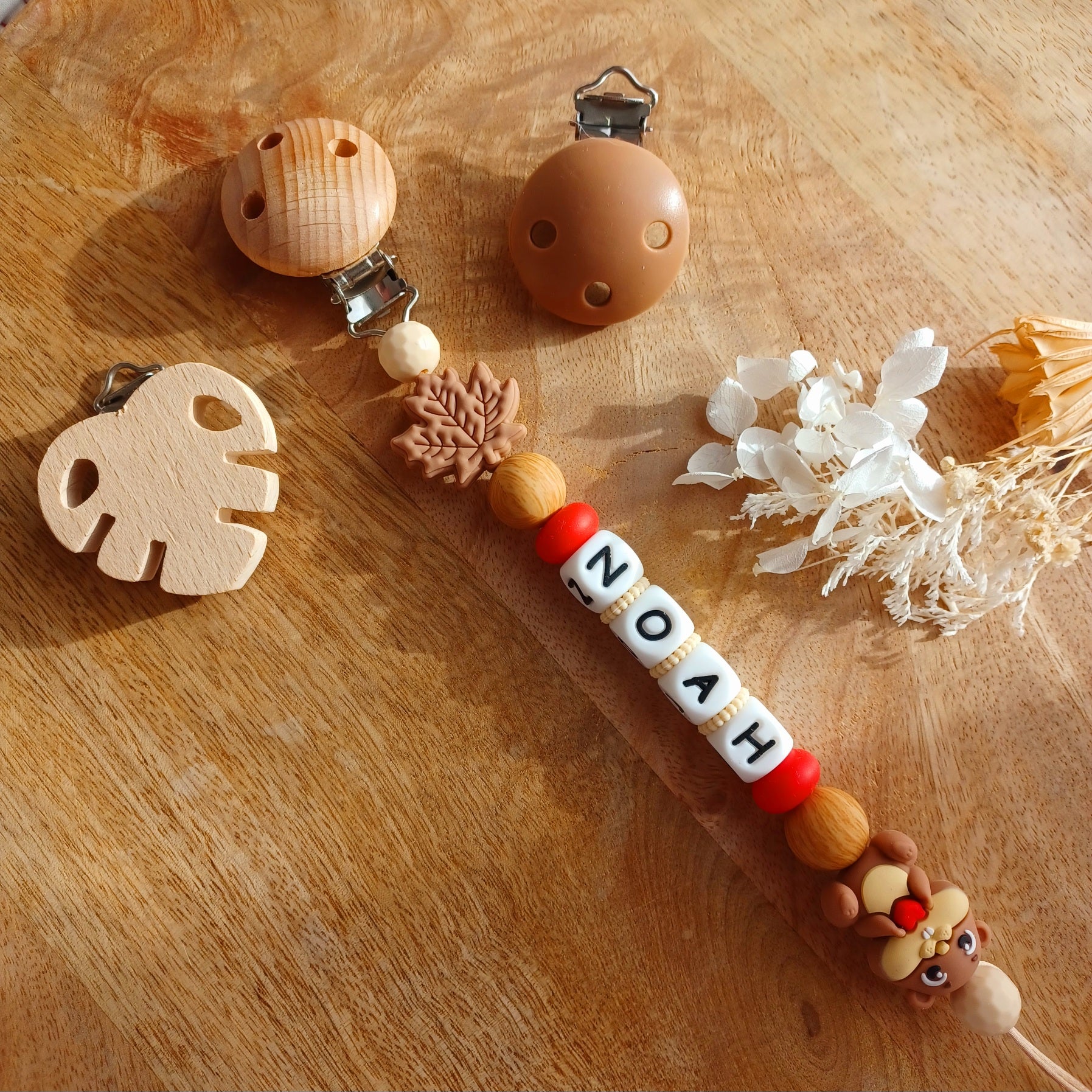 Attache tétine silicone, Castor, crème, choco. Noah