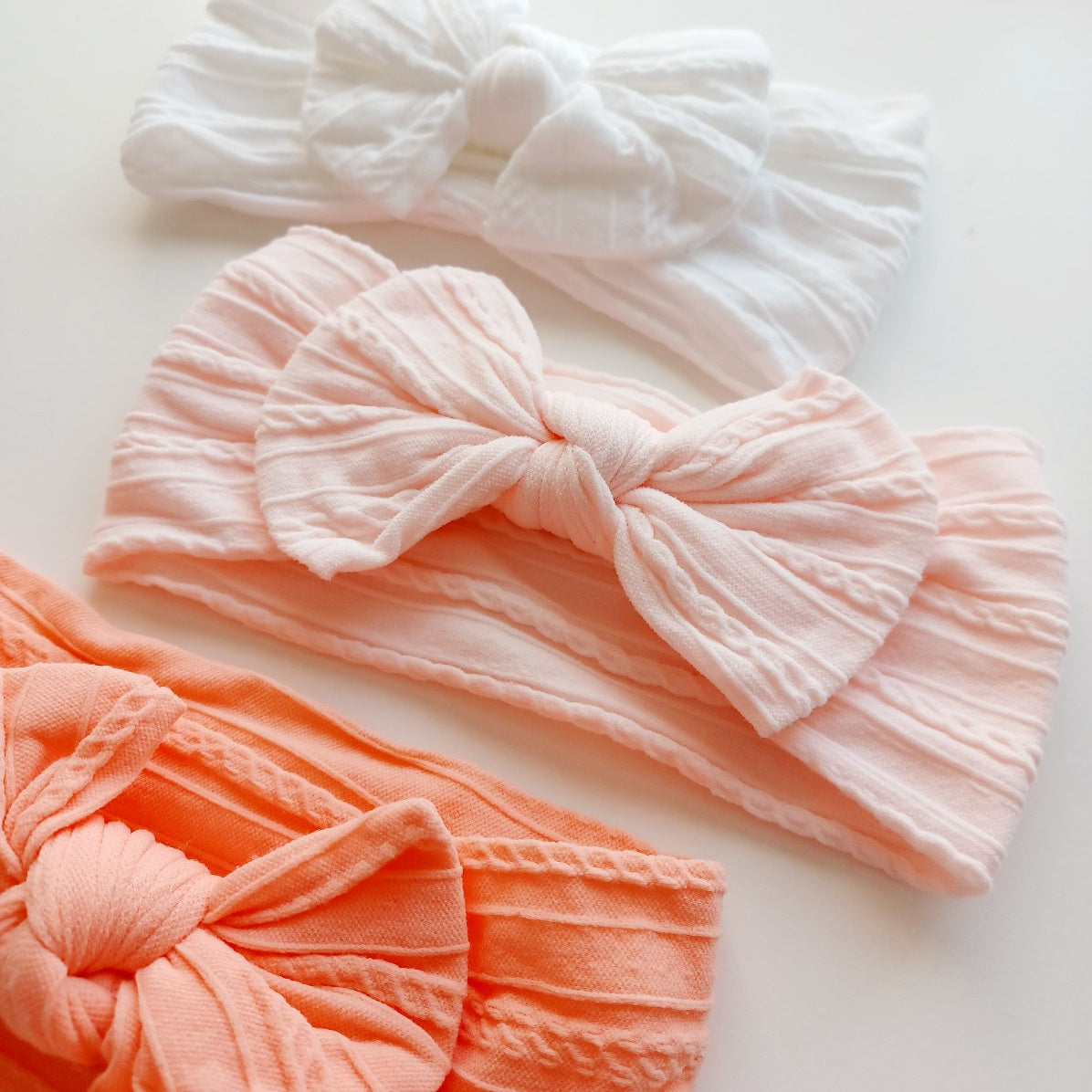 Bandeau bébé élastique avec nœud – Doux, extensible et confortable (Blanc, Nectar, Abricot)