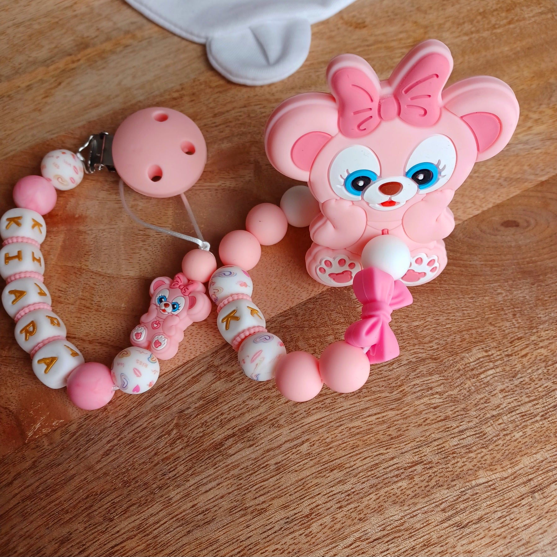 Attache tétine silicone, Oursonne rose blanc.