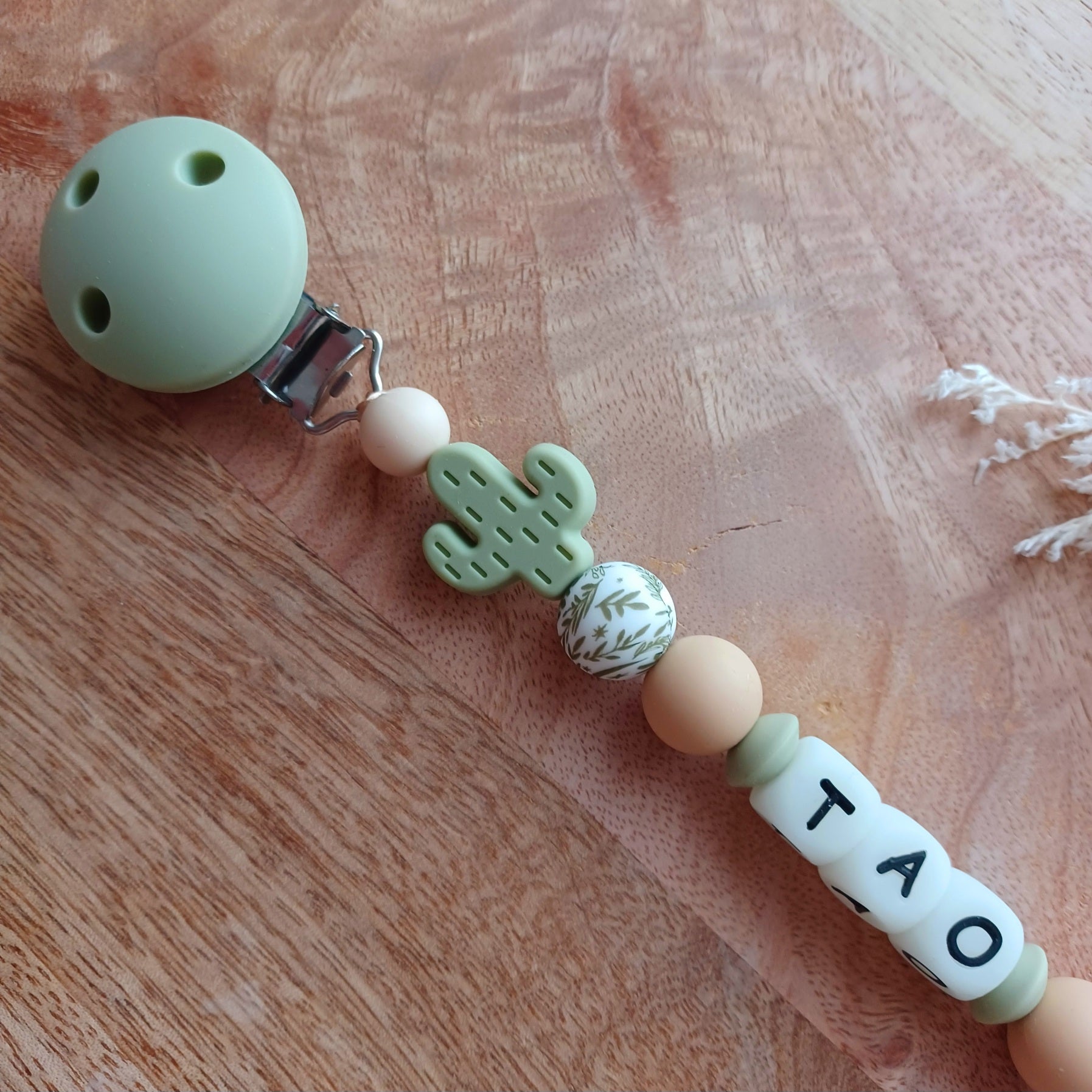 Attache tétine silicone, voiture, blanc, vert. Tao