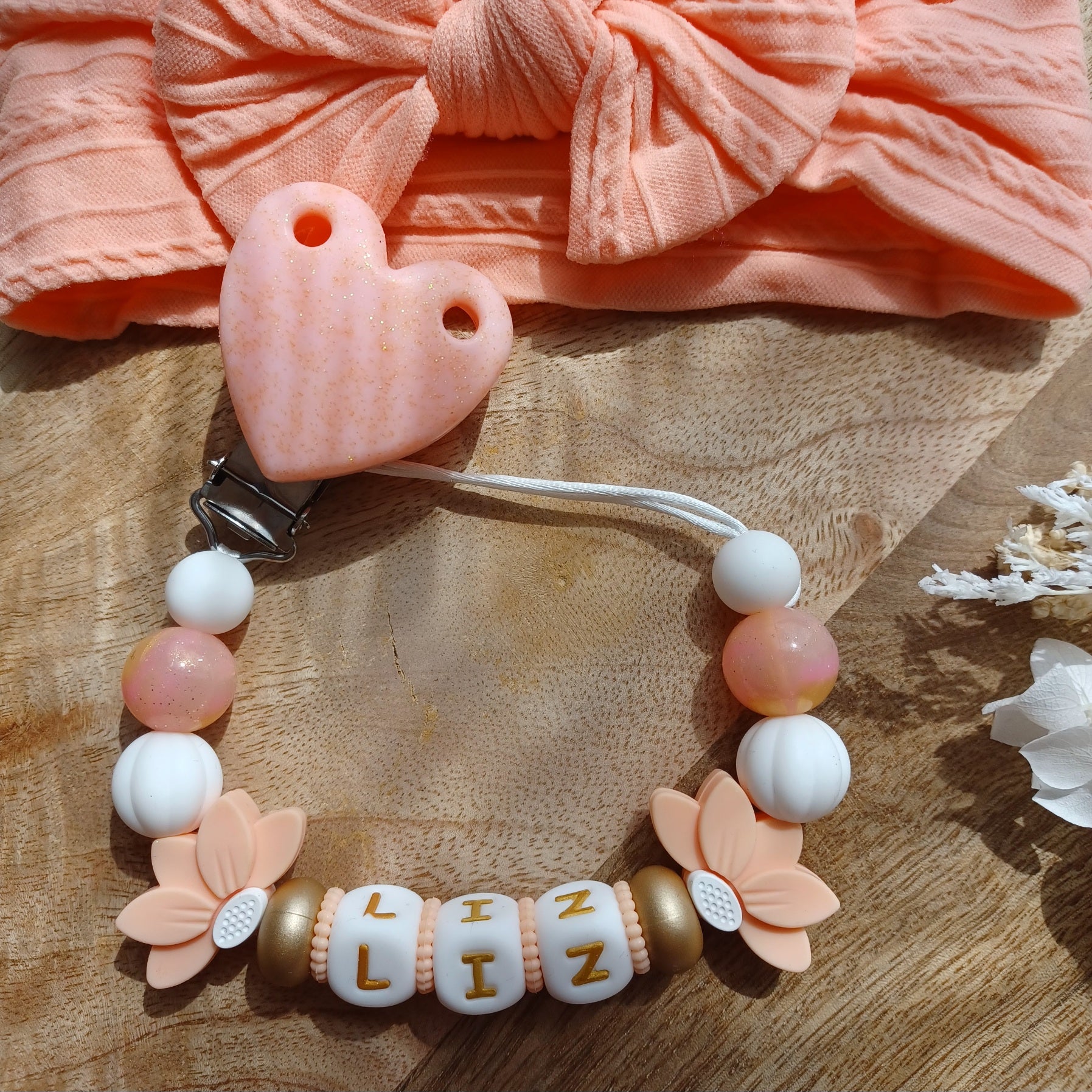 Attache tétine silicone, Fleur de Lotus, coeur abricot