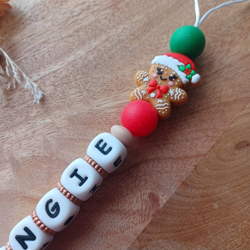 Attache tétine silicone, Boule de Neige, Noël, bonhomme épices.