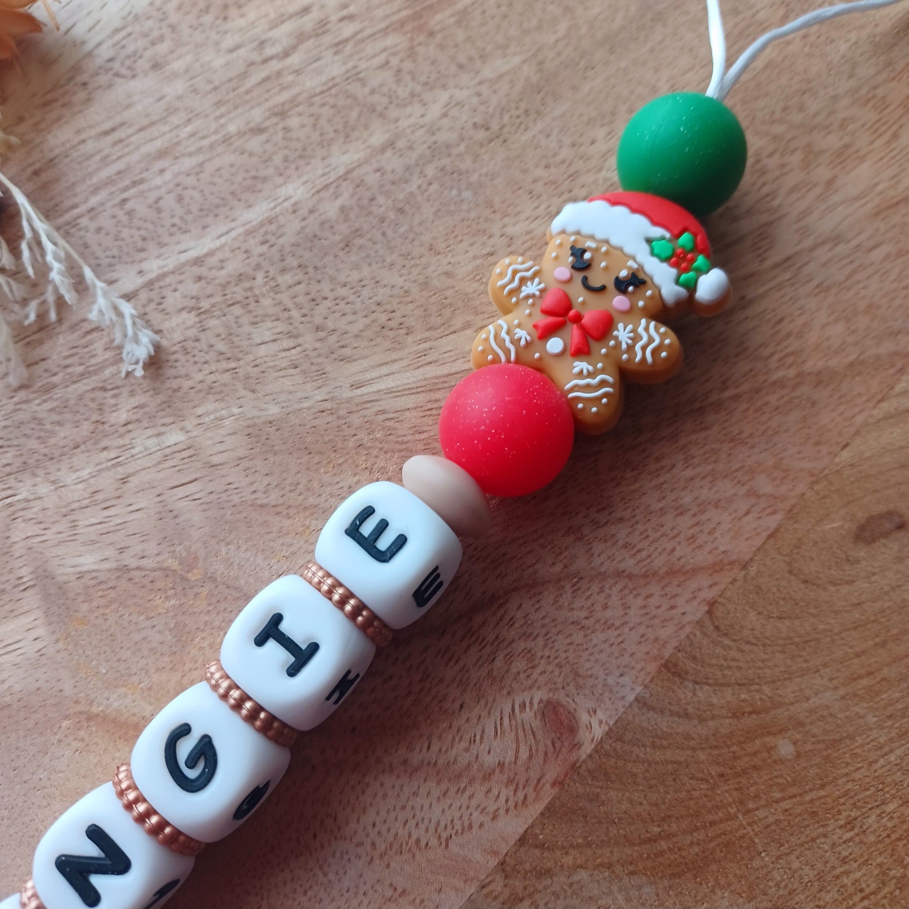 Attache tétine silicone, Boule de Neige, Noël, bonhomme épices.